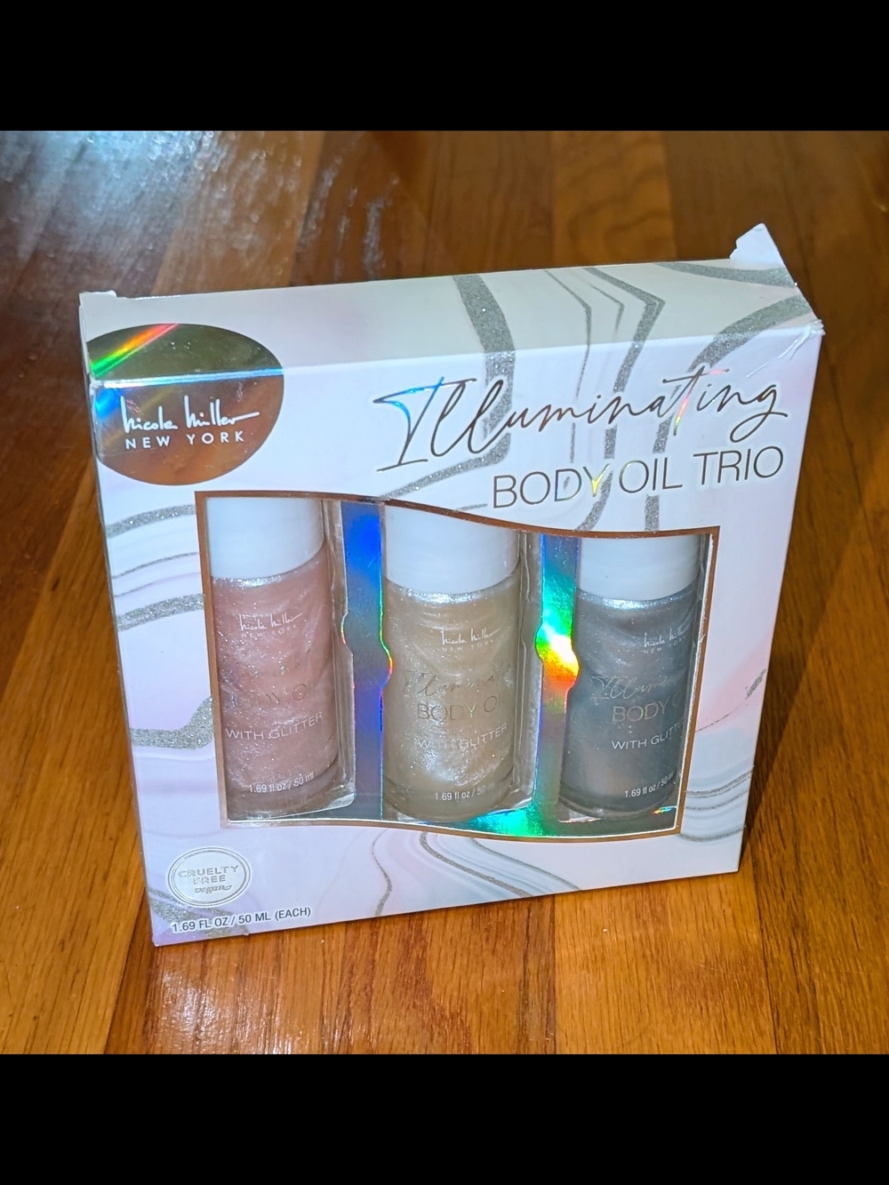 Nicole Miller Illuminating Body Oil Trio - Pink, Gold, Silver
